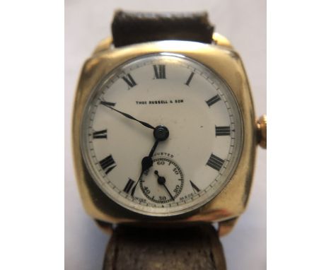 A vintage Thomas Russell and Sons 9 carat gold cased ladies wristwatch with white enamel dial, subsidiary dial and a leather 