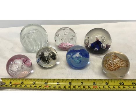 Caithness crystal glass paperweights, 3 small moon crystal, 1 small wisp, 1 large moonflower, 2 other unmarked glass paperwei