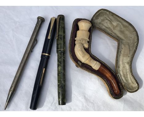 Fountain pen, The de la rue, green marble effect with 14ct nib, Wyvern 404 pen, Eversharp silver pencil and a Meerschaum case