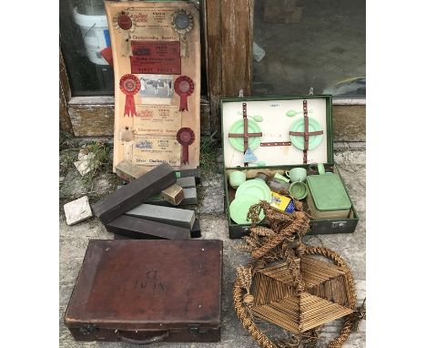 Sirram part picnic set, small leather case, 46cms w, 10 pianola rolls and a poster showing rosettes and certificates for priz