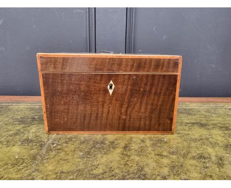 A George III harewood, tulipwood crossbanded and line inlaid tea caddy, with bone escutcheon, 23.5cm wide.&nbsp;&nbsp; 