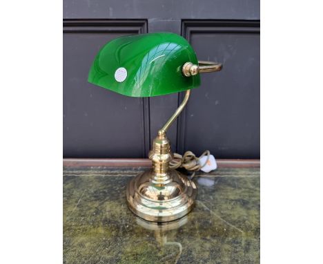 A reproduction glass and green glass desk lamp.&nbsp; 