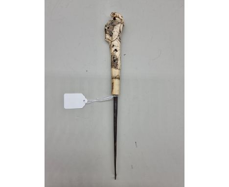 A good Japanese carved stag antler obi-hasami or Sashi netsuke, Meiji, probably Asakusa school, finely decorated with two toa