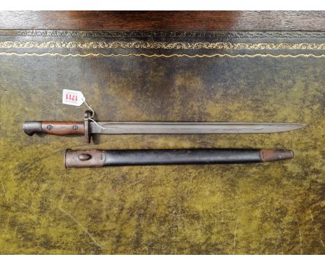 A World War I British Army 1907 pattern bayonet and scabbard, by Wilkinson Sword, with 43.5cm blade.