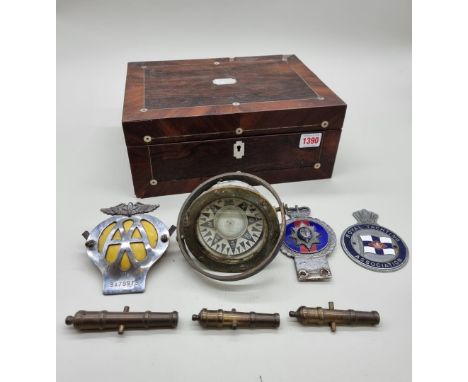A mixed lot,&nbsp;to include three car radiator badges; and a ship's gimbal compass.&nbsp; 