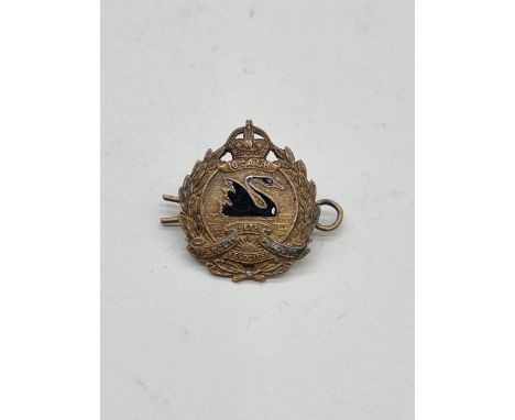 A World War I Australian 10th Light Horse Regiment brass and black enamel cap badge,&nbsp;marked J R Gaunt, London, 3.5cm hig