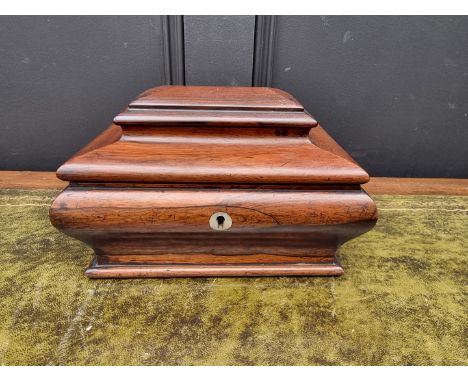 A Victorian rosewood bombe sarcophagus tea caddy, 25cm wide, (lacking feet). 