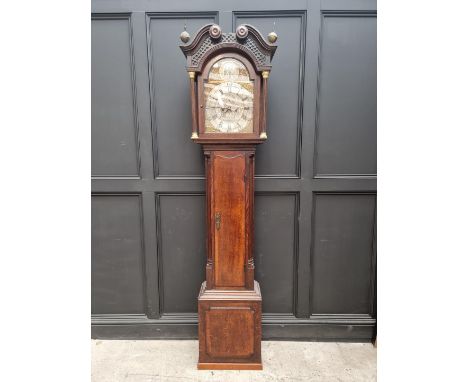 A George III oak and mahogany crossbanded eight day longcase clock, the 12in arched silvered dial inscribed 'Chas Barrett, Sh