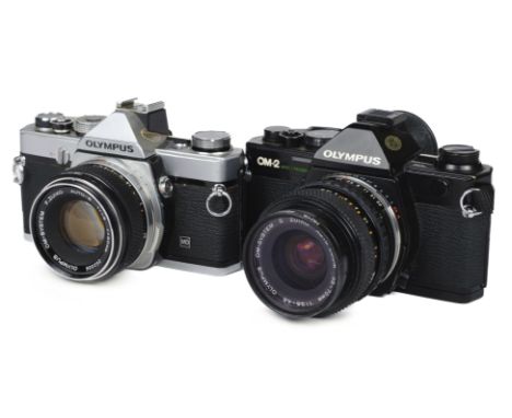 * Olympus. Collection of Olympus OM-system 35mm cameras, lenses and accessories, including Olympus OM-1 black &amp; silver ca