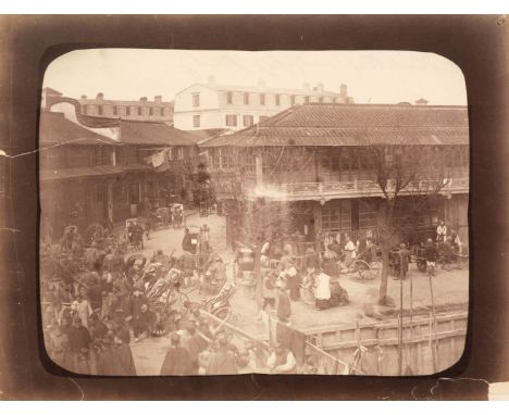 * China. Rickshaw Square, possibly Shanghai, by William Saunders, c. 1870, albumen print, 21 x 27 cm, small tear to left edge