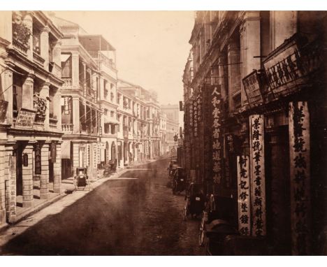 * Hong Kong. Queen’s Road, Hong Kong, c. 1870, albumen print, 20.5 x 27 cm, card mount with contemporary inscription in Germa