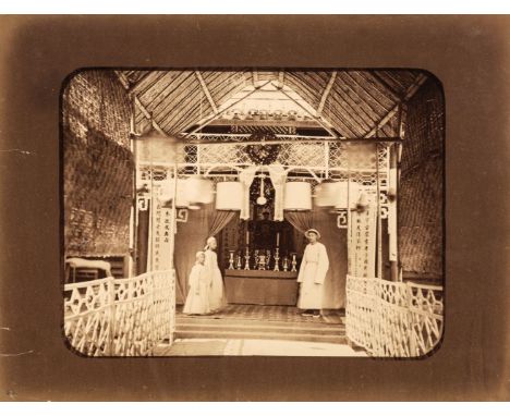 * China. Chinese praying for a deceased person and dressed in white, possibly by William Saunders, c. 1870, albumen print, 20