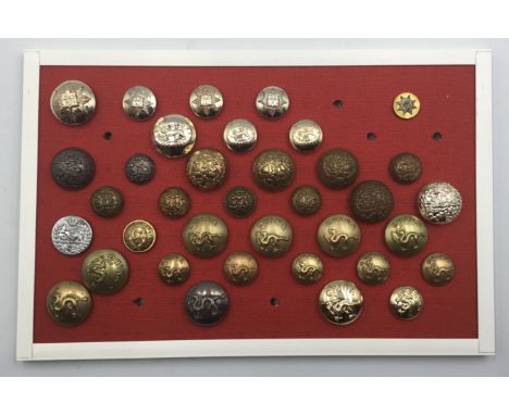 A good selection of 19th and 20th century regimental tunic buttons. To include examples for: the Royal Anglian Regiment (used