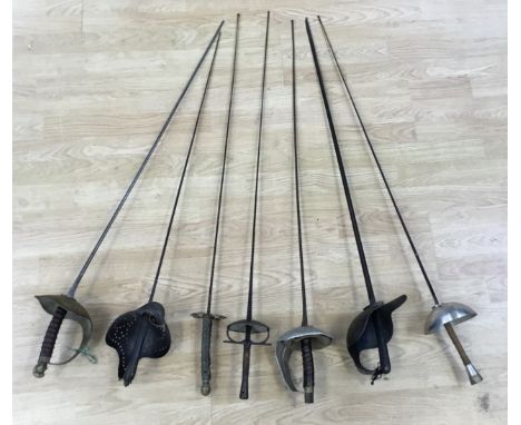 A selection of 19th and early 20th century fencing foils, made in various hilt and blade styles, with some resembling cavalry