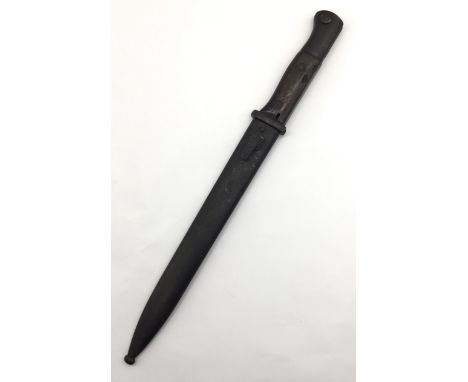 A WW1 era Imperial German M84/98 Mauser bayonet by Gottlieb Hammesfahr Solingen Foche. With wooden slab grips, secured by 2 r