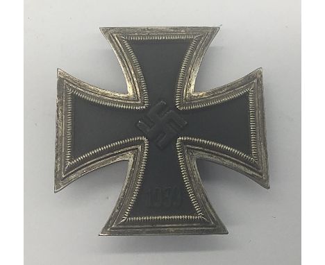 A WW2 era German Iron Cross 1st class, screw back, with vaulted or convex appearance. Usual construction style, with a painte