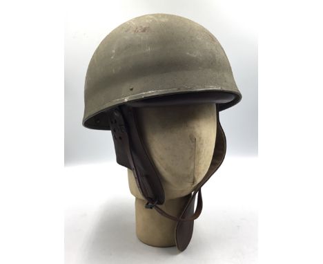 A good WW2 era British military dispatch rider’s helmet, dated 1942 to the leather interior, along with the size 7 in shield,