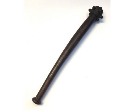 A WW1 trench raiding mace or club, likely British in origin. Featuring a slightly curved polished oak handle, with pommel, an
