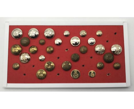 A selection of late 19th, and 20th century brass and anodised British Cavalry regiment tunic buttons. To include examples for