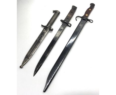 A trio of bayonets, to included a Swedish M1896 bayonet with scabbard, an Indian made No.1 MKII* sword bayonet dated November