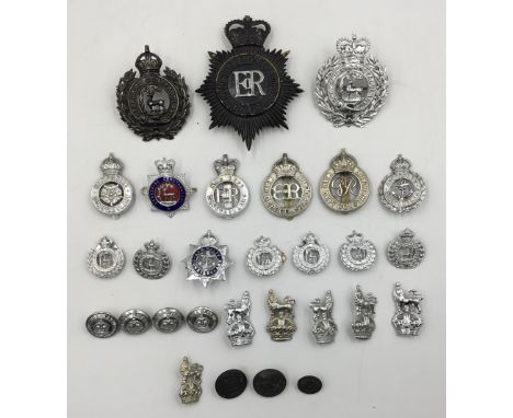 A good selection of British pre and post WW2 Police badges, helmet plates, and buttons. To include: a scarce Edward VIII War 