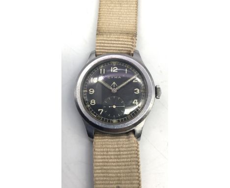 An original late WW2 era ‘Dirty Dozen’ watch by Cyma, complete with NATO strap, and 2 additional spare straps. With a stainle