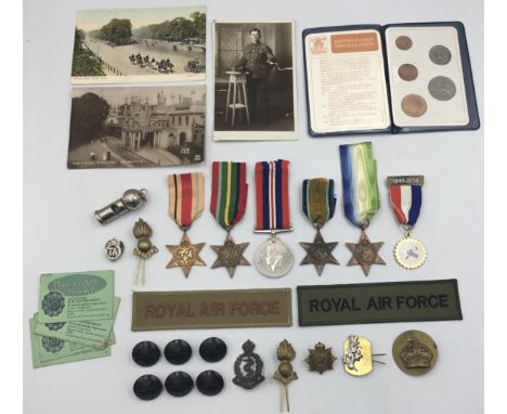 A selection of WW2 medals, modern Royal Air Force cloth badges, and other items. To include: the Burma Star (incorrectly fitt