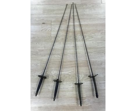 A pair of late 19th century German made Solingen fencing foils, together with another similar pair, also likely German in ori