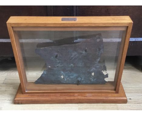 A fine and scarce large fragment of copper sheathing, salvaged from the wreckage site of HMS Bounty, in Bounty Bay at Pitcair