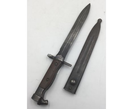 A scarce Egyptian Hakim bayonet, for use with the 8mm Hakim Self Loading Rifle. With wooden slab grips secured by 2 screws, s