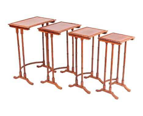 An unusual Sheraton period quartetto of palissandre "nesting" occasional tables with captive tulipwood crossbanding and cross