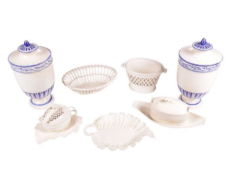 A small collection of creamware porcelain; comprising a melon tureen and cover on a leaf dish, 20 cm wide, a Wedgwood basket,