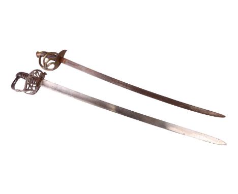 A 19th century Heavy cavalry sword and scabbard with anthemion and ladder pierced hilt, wire bound hardwood grip and single f