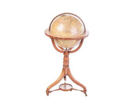 An early 19th century Cary’s New Terrestrial library Globe, bearing the legend to the gores with brass register and in a maho