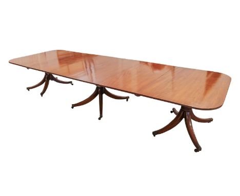 A part George IV three-pillar extending "D-end" dining table, each snap top section supported by inverted sabre quadrupedal b