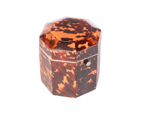 A small Regency tortoiseshell and ivory tea caddy, of octagonal form with hinged cover, 8 cm high x 8 cm wide.Ivory certifica