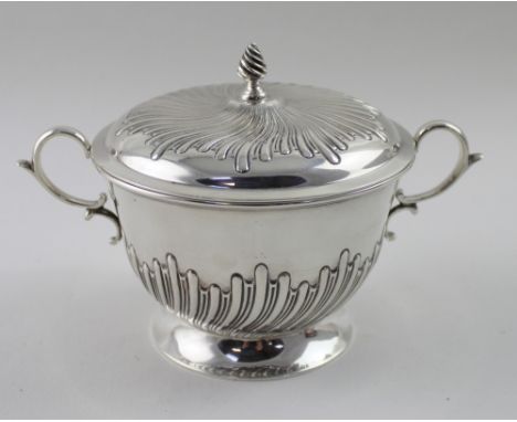 A Victorian hallmarked silver twin-handled lidded sucrier with gadrooned detail, Henry Stratford, Sheffield 1887, diameter 16