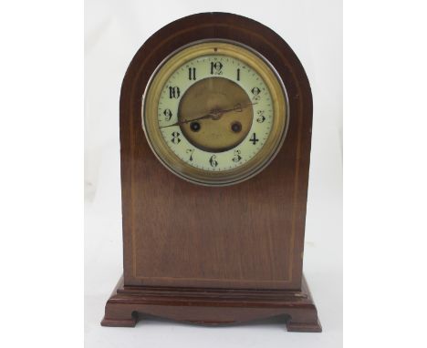A Victorian inlaid mahogany mantel clock, the enamel chapter ring set with Roman numerals, the Vincent movement striking on a