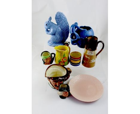 A quantity of ceramics to include Beswick vase with climbing monkeys in blue, Sylvac squirrel ornament, a Royal Doulton large