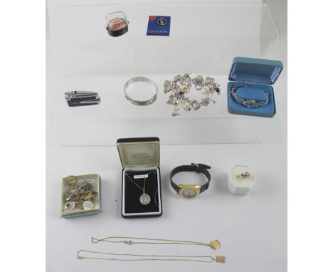 A quantity of costume jewellery to include two gold necklaces, one with St Christopher, the other with small diamond set 12th