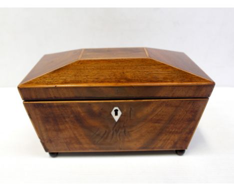 A 19th century inlaid mahogany tea caddy of sarcophagus form with two-section lidded interior, on ball feet, width, 23.5cm.