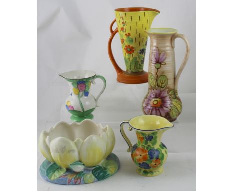 A Clarice Cliff 'Water Lily' bowl, green stamped signature to base, diameter 23cm and four Art Deco pottery jugs (5).