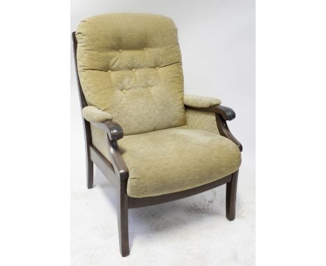 A modern wooden-framed armchair upholstered in woven cream material with button back, on square tapering legs.