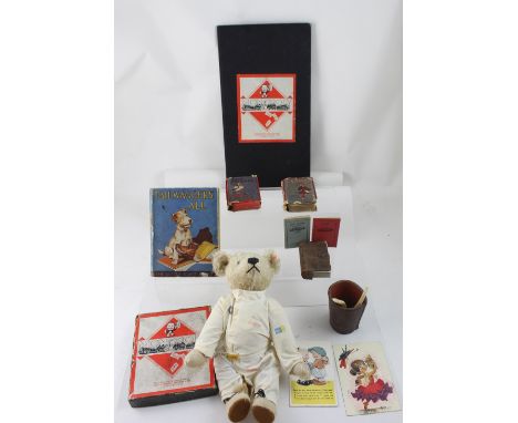 A Steiff BMW teddy bear (995163), a Mabel Lucie Attwell postcard, 'Bones' instrument, vintage games to include Monopoly etc.