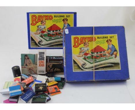A Bayko Building Set Number 0, a Bayko Building Set Number 1 and a quantity of Match boxes of varying designs.