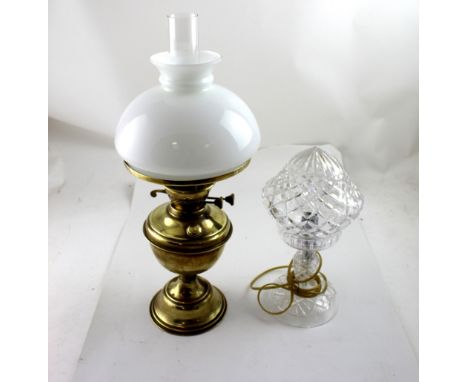 A cut glass mushroom lamp  and a brass oil lamp with milk glass shade, height 51cm (2).