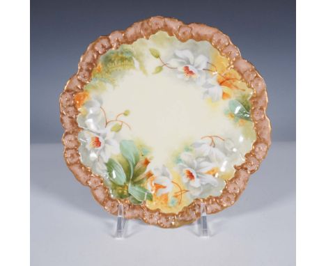 A beautifully hand-painted A. Lanternier Limoges porcelain plate featuring an exquisite floral design. This finely crafted pi