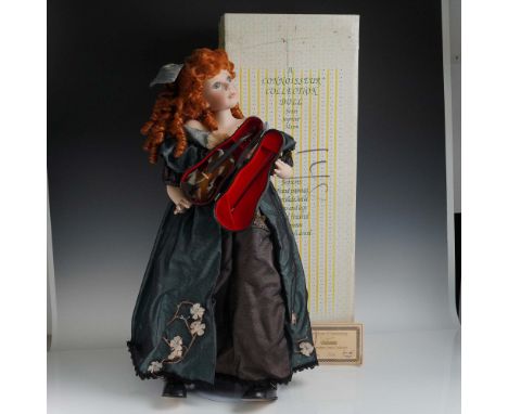 From the Seymour Mann Signature Series, this limited edition doll is designed by artist J.C. Lee and numbered 187 of 2500. Th