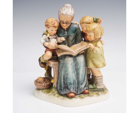 Crafted by Goebel in Germany, this M.I. Hummel figurine titled A Story From Grandma is a heartwarming limited edition scene d