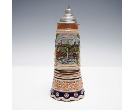 1972 commemorative German beer stein featuring a colorful relief scene of Olympia-Stadt MÃ¼nchen with the Olympic rings and t